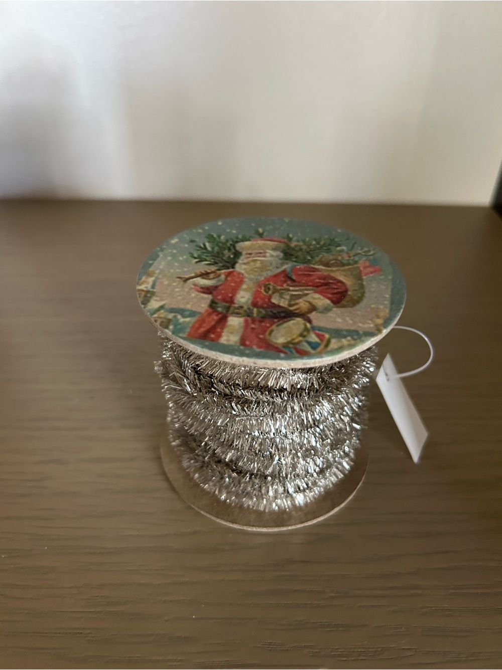 Silver Holiday Tinsel Garland Spool with Vintage Santa Top